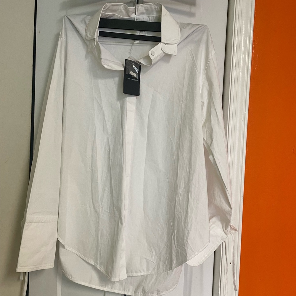 White women elegant shirt with long sleeves.